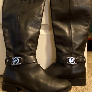 Michael Kors tall black riding boots with silver MK insignia